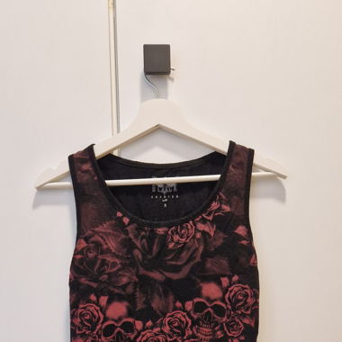 Top with red skulls and roses