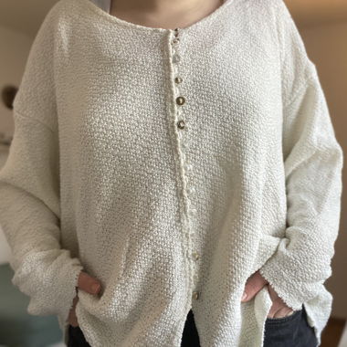 Cream-coloured bouclé cardigan with buttons