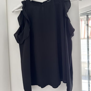 Off-shoulder black blouse