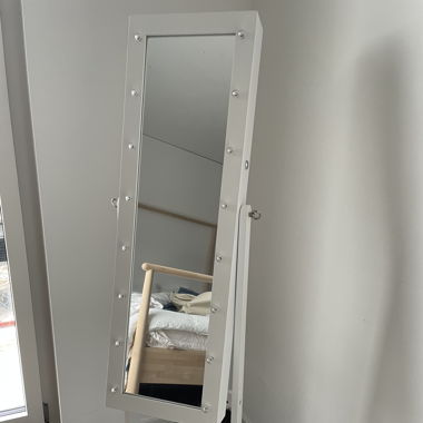 White standing vanity mirror with lights