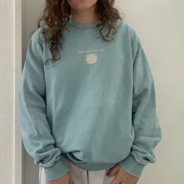 türkiser Rhythm Sweater