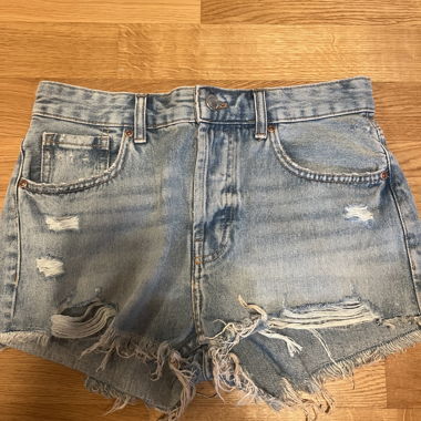 Distressed denim shorts