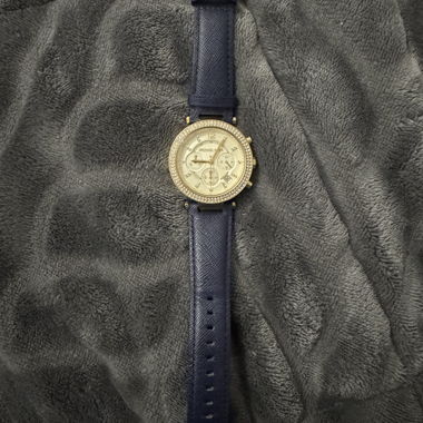 Montre Michael Kors dorée avec bracelet bleu