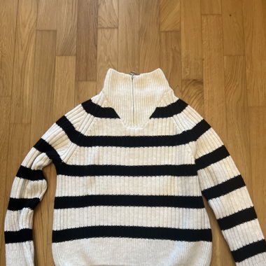Black and white turtleneck sweater