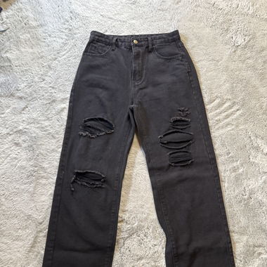 Schwarze Jeans mit löchern
