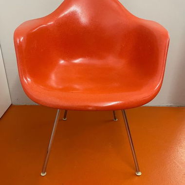 Eames Fiberglas Armchair in red orange