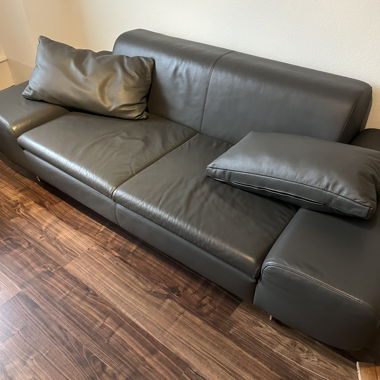 Leather-look sofa by DESIGNWERK