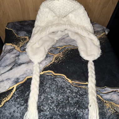 White winter hat with ear flaps