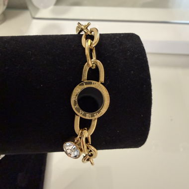 Gold-tone bracelet with stone