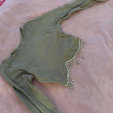 Top da donna a coste con strass