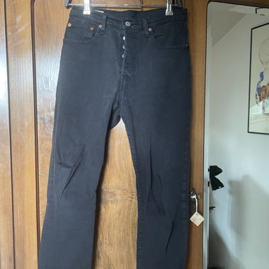Jeans nere con bottoni