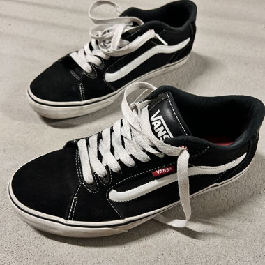 Vans black high-top sneakers