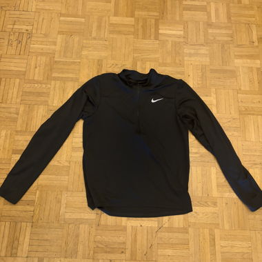 Top sportivo Nike nero con zip