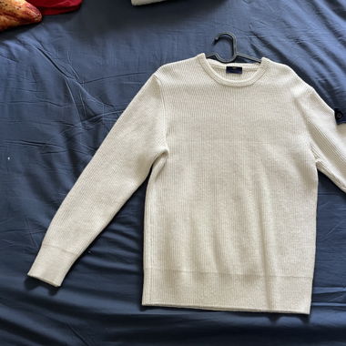 White knitted sweater
