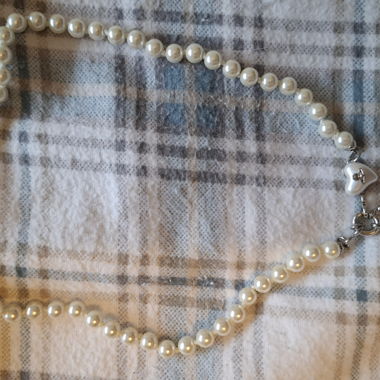 Collier de perles avec pendentif coeur
