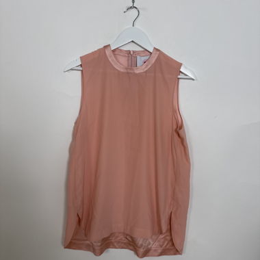 Pink sleeveless blouse