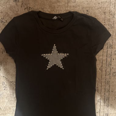 Y2K black T‑shirt with sequin star
