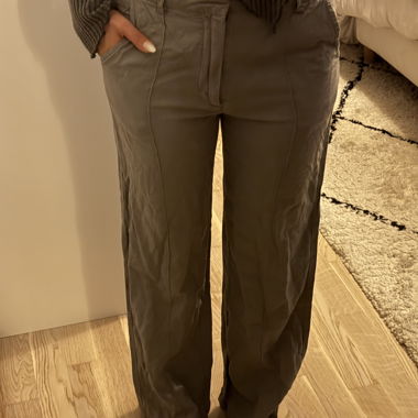 Thin grey trousers