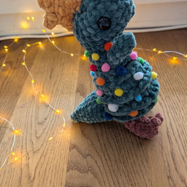 Crochet Christmas tree dinosaur plushie