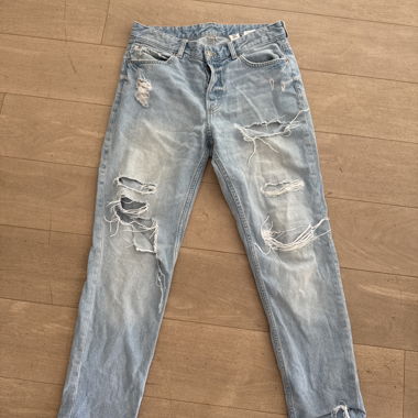 Jeans Blu Lungo con Buchi