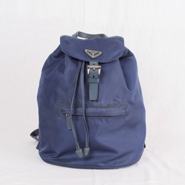 Auth PRADA sac à dos à cordon en nylon et cuir bleu