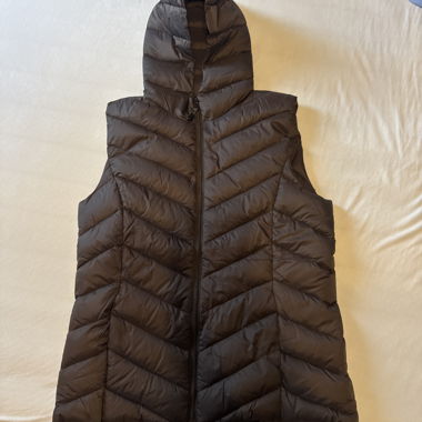 Black quilted vest with hood
