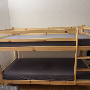 Wooden bunk bed with 2 mattresses