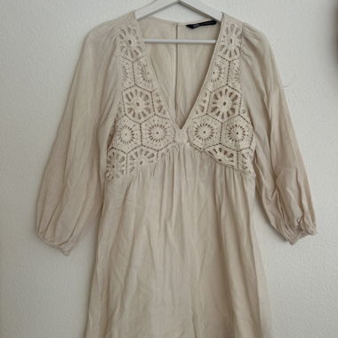 Tuta in pizzo color crema