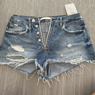 Short en jean avec franges