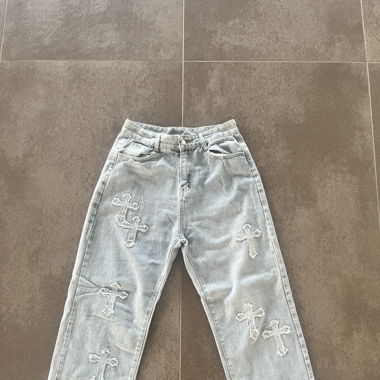 Baggy jeans with crosses