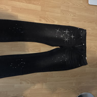 Jeans neri con stelle XL o L