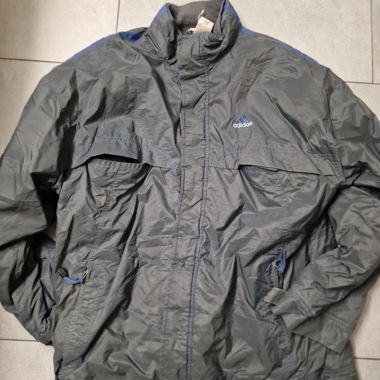 Giacca antivento Adidas grigia