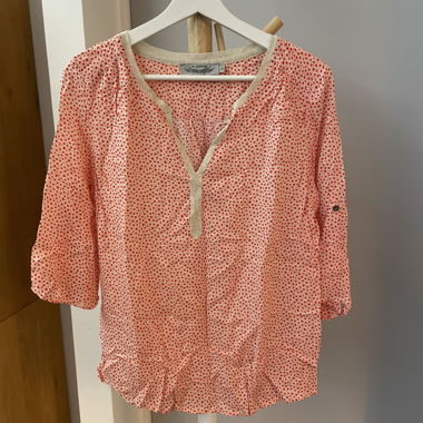 Blusa bianca e rossa a motivi