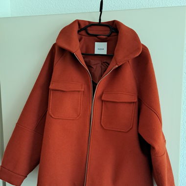 Orange Übergangsjacke