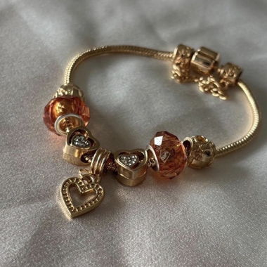 Bracelet à breloques dorées