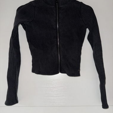 Veste en tricot noire à fermeture éclair