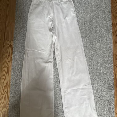 Pantaloni a gamba larga beige chiaro