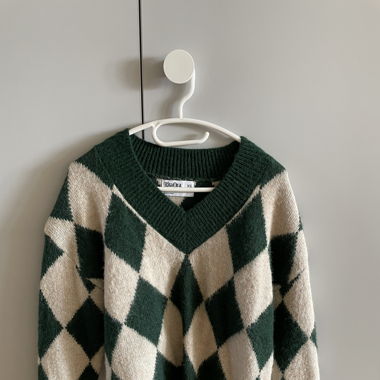 Pull à carreaux 