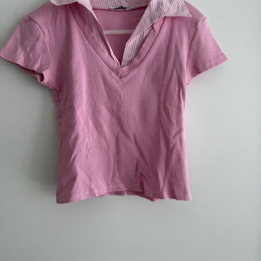Polo rose à col