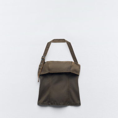 BESCHICHTETES TOP MIT SCHNALLEN