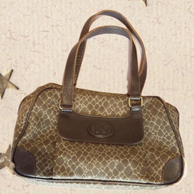 nina ricci turtoise print handbag