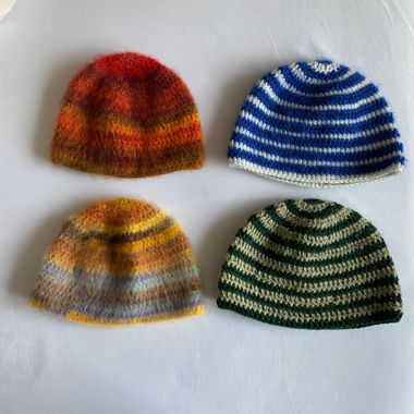 cuffie all'uncinetto fatte a mano