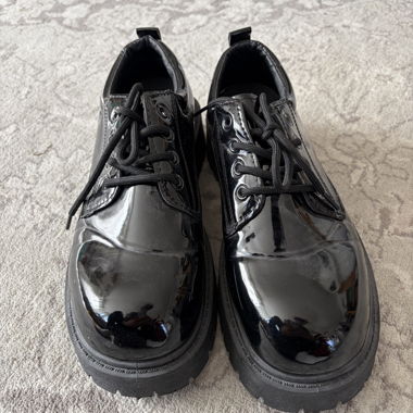 Chaussures à plateforme en vernis noir