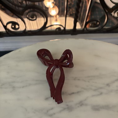 Fermaglio bordeaux a forma di fiocco