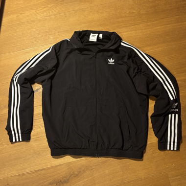 Schwarze adidas Jacke