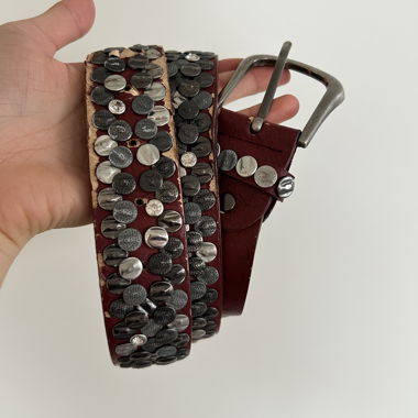 Red leather belt with metal studs