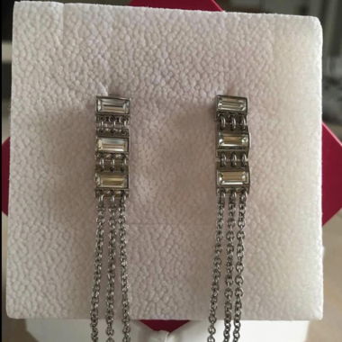 Boucle d’oreille swatch