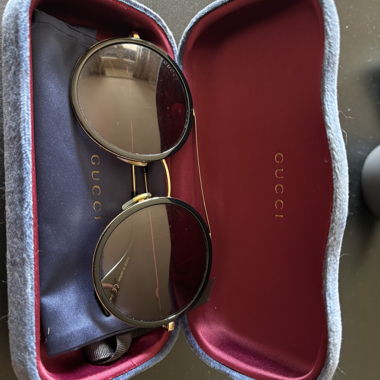 Occhiali da sole rotondi Gucci con astuccio