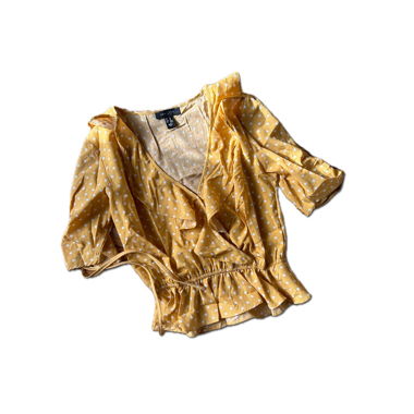 Yellow and white polka dot blouse