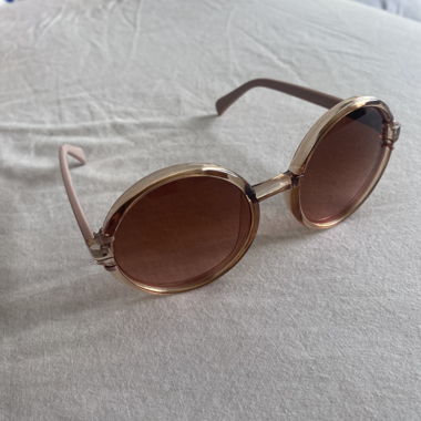 Lunettes de soleil rose